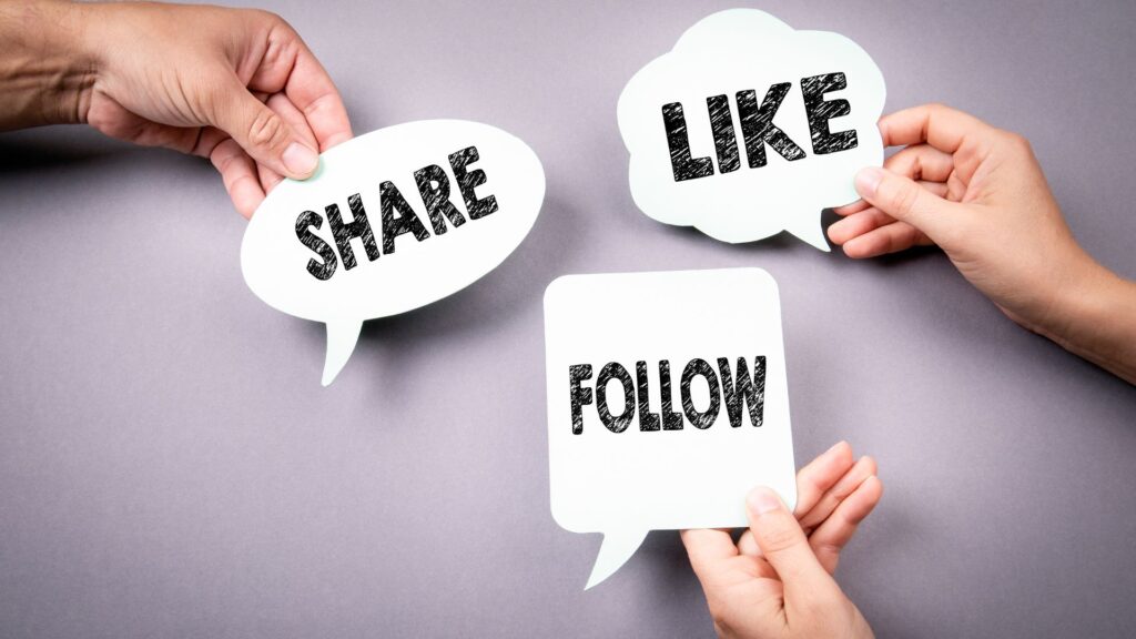 3 hands holding signs in the shapes of speech bubbles that contain the words "Share", "follow", and "like."